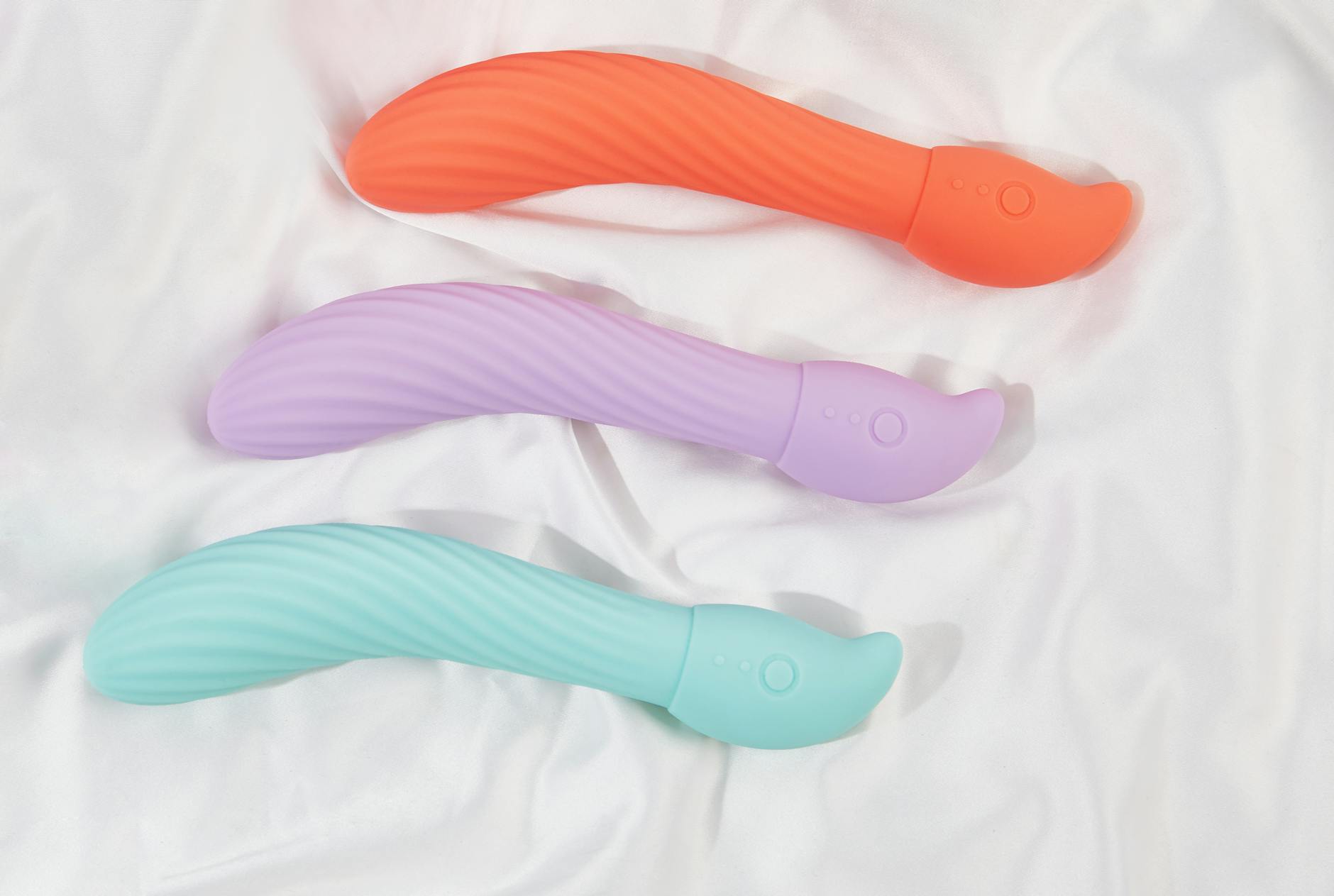 Bright yellow lemons arranged on a pastel green background, symbolizing the fresh approach to pleasure with lemon clitoral vibrators